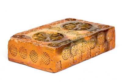 Rare Stamp-Decorated Redware Doorstop, PA origin, 19th century