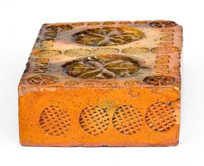 Rare Stamp-Decorated Redware Doorstop, PA origin, 19th century