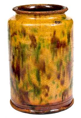 Fine Eastern Pennsylvania Redware Jar with Three-Color Slip Decoration