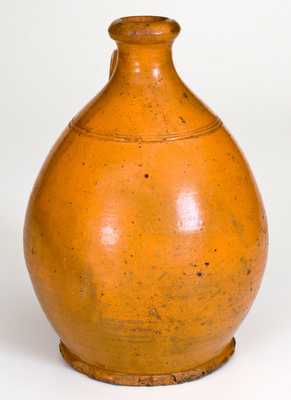 American Redware Jug with Bright Orange Glaze