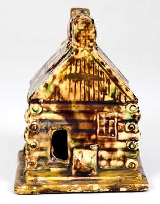 Rare Thomas Haig (Philadelphia) Flint Enamel Log Cabin Bank with Raccoon