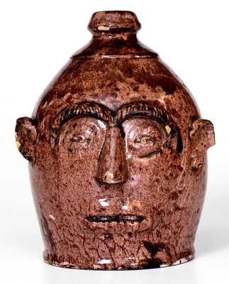 Outstanding Redware Pottery Face Jug, Ontario, circa 1880