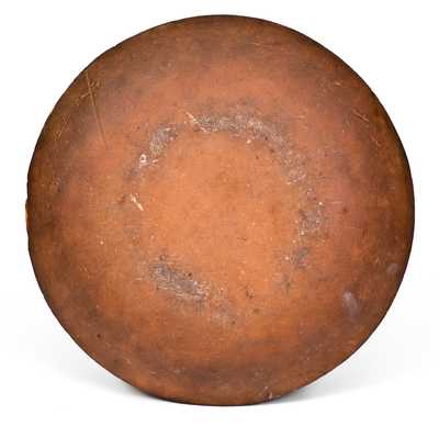 Exceptional Slip-Decorated Redware Plate, English origin, probably 18th century