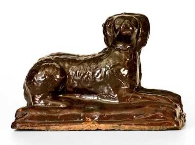 Stoneware Reclining Dog Doorstop, Jane Lew, WV, circa 1880, Dark-Brown Glaze