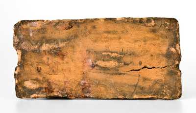 Stoneware Reclining Dog Doorstop, Jane Lew, WV, circa 1880, Dark-Brown Glaze