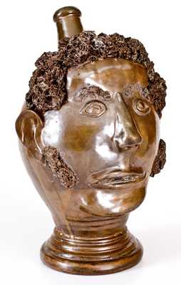 Exceedingly Rare and Important Stoneware Face Harvest Jug Depicting an African-American Man, Northeastern U.S. or Ohio, circa 1830-60