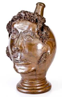 Exceedingly Rare and Important Stoneware Face Harvest Jug Depicting an African-American Man, Northeastern U.S. or Ohio, circa 1830-60