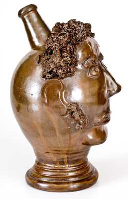 Exceedingly Rare and Important Stoneware Face Harvest Jug Depicting an African-American Man, Northeastern U.S. or Ohio, circa 1830-60