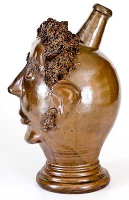 Exceedingly Rare and Important Stoneware Face Harvest Jug Depicting an African-American Man, Northeastern U.S. or Ohio, circa 1830-60