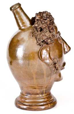 Exceedingly Rare and Important Stoneware Face Harvest Jug Depicting an African-American Man, Northeastern U.S. or Ohio, circa 1830-60