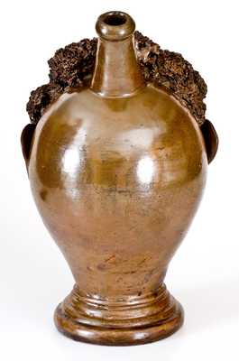 Exceedingly Rare and Important Stoneware Face Harvest Jug Depicting an African-American Man, Northeastern U.S. or Ohio, circa 1830-60