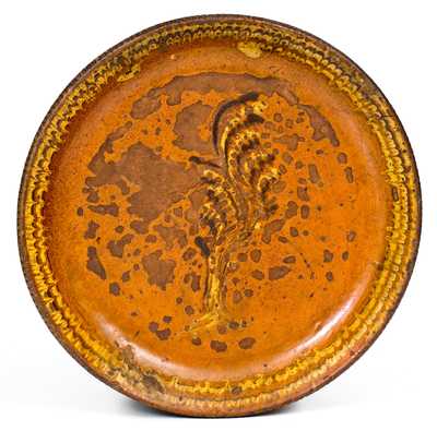 Unusual Redware Dish with Two-Color-Slip Foliate Decoration, Mid-Atlantic, late 18th / early 19th century