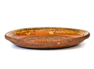 Unusual Redware Dish with Two-Color-Slip Foliate Decoration, Mid-Atlantic, late 18th / early 19th century