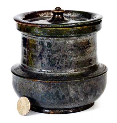George Ohr Pottery Lidded Vase, Stamped G.E. OHR / Biloxi, Miss., late 19th century.  H (including lid) 5 1/4 ; Diam. (at widest point) 5 1/4. 