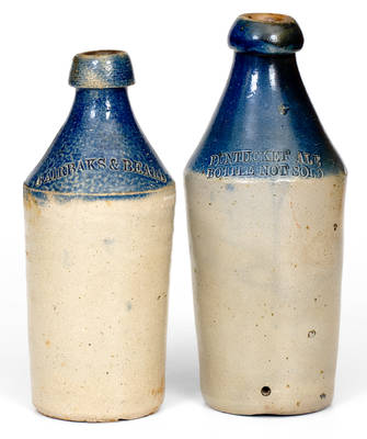 Lot of Two: Stoneware Bottles with Cobalt Dip and Impressed Advertising