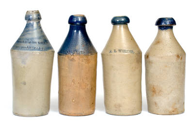 Lot of Four: Stoneware Bottles with Cobalt Tops