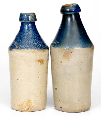 Lot of Two: Stoneware Bottles with Cobalt Dip and Impressed Advertising