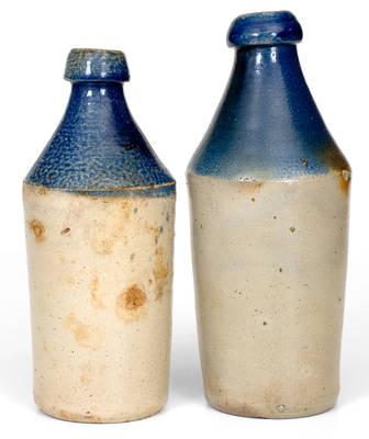 Lot of Two: Stoneware Bottles with Cobalt Dip and Impressed Advertising