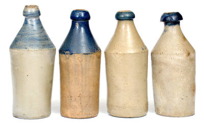 Lot of Four: Stoneware Bottles with Cobalt Tops