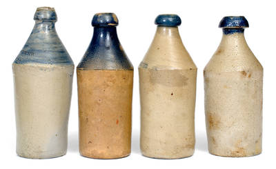 Lot of Four: Stoneware Bottles with Cobalt Tops