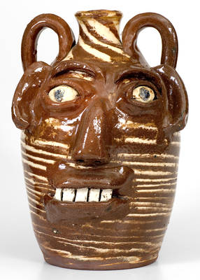 B.B. Craig Stoneware Face Jug, Swirled Clay