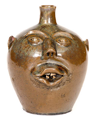 BROWN POTTERY Face Jug w/ Rutile in the Glaze