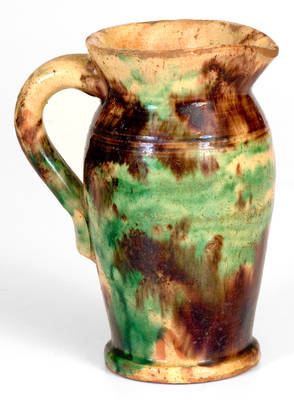 Strasburg, VA Multi-Glazed Redware Cream Pitcher, circa 1890