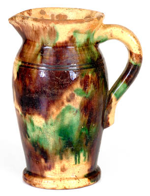 Strasburg, VA Multi-Glazed Redware Cream Pitcher, circa 1890