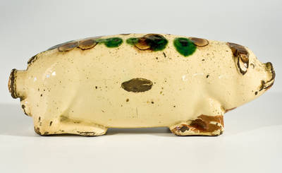 Extremely Rare Slip-Decorated Redware Pig Bottle, Stamped 
