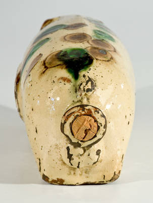 Extremely Rare Slip-Decorated Redware Pig Bottle, Stamped 