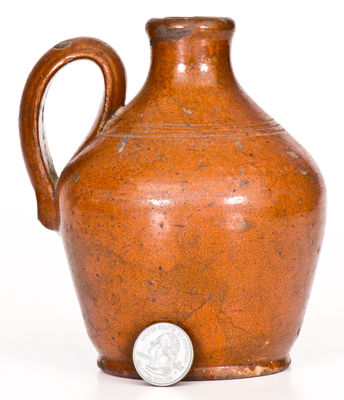 Fine Small-Sized North Carolina Moravian Redware Jug, late 18th / early 19th century