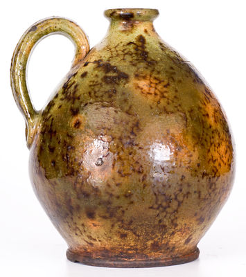 Fine New England Redware Jug, Green with Brown Sponging