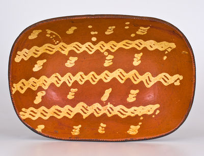 Large-Sized Redware Loaf Dish with Elaborate Slip Decoration, Philadelphia, PA origin