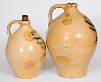 Lot of Two: G. HEISER / BUFFALO Ovoid Stoneware Jugs w/ Similar Decorations