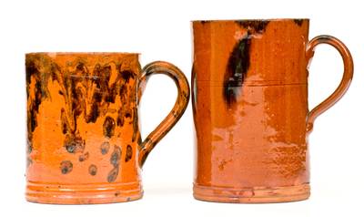 Two Glazed Redware Mugs, American, 19th century