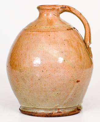 Fine Ovoid Glazed New England Redware Jug