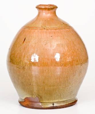 Fine Ovoid Glazed New England Redware Jug