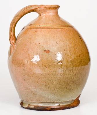 Fine Ovoid Glazed New England Redware Jug