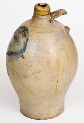 Fine and Rare Stoneware Jug with Incised Man s Head Decoration