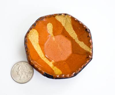 Outstanding Miniature Octagonal Redware Dish with Yellow Slip Decoration, Philadelphia origin