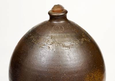 2 Gal. Stoneware RUM Jug w/ Coggled Bird Decoration att. Branch Green, Philadelphia, PA