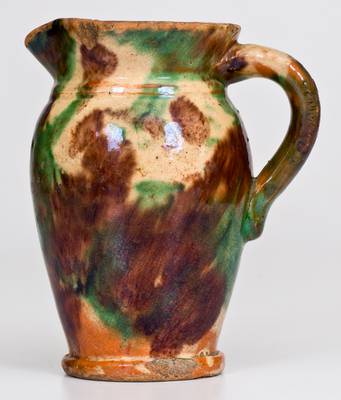 Shenandoah Valley Multi-Glazed Redware Cream Pitcher, circa 1890