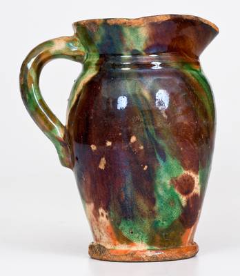 Shenandoah Valley Multi-Glazed Redware Cream Pitcher, circa 1890