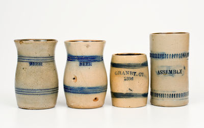 Four Cobalt-Decorated Northeastern American Stoneware Mugs