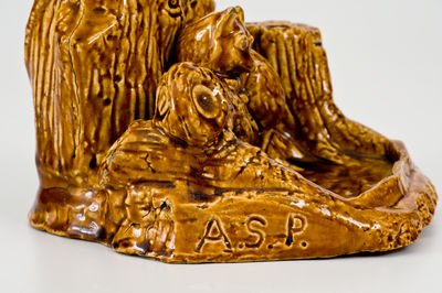 Exceptional Fulper Pottery Rockingham Raccoon Match Holder, "MADE / BY / A.H. Prall /1903" (New Jersey)