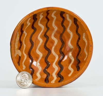 Small-Sized Redware Dish with Two-Color Slip Decoration, PA origin, probably Berks County, Pennsylvania