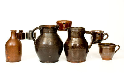 Eight Pieces of Manganese-Glazed Redware,  primarily Washington County, Maryland