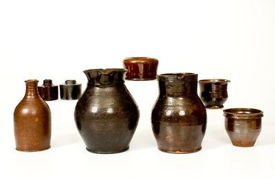 Eight Pieces of Manganese-Glazed Redware,  primarily Washington County, Maryland