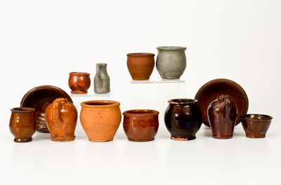 Thirteen Miniature Pottery Pieces, Mid-Atlantic origin, 19th century