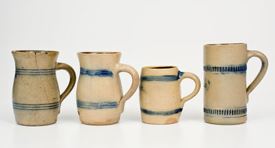 Four Cobalt-Decorated Northeastern American Stoneware Mugs